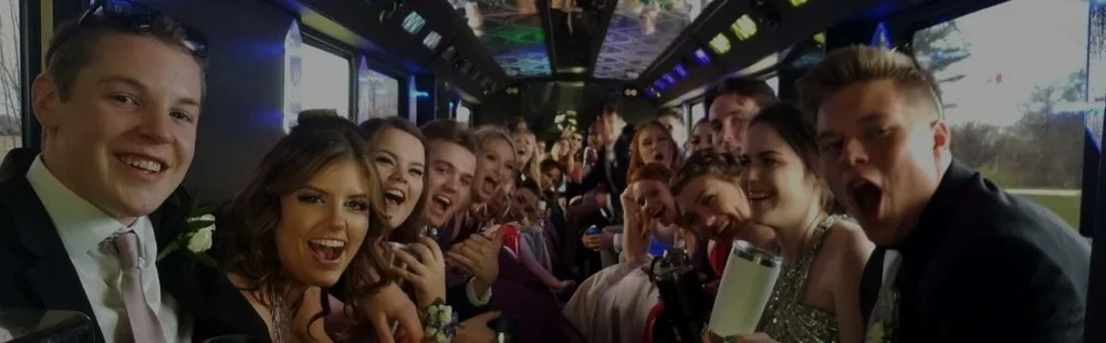 A prom group celebrating inside a luxury Toronto party bus
